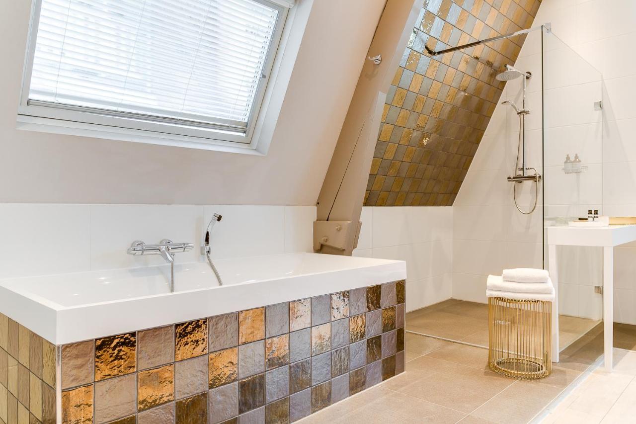 Brasss Hotel Suites Haarlem Esterno foto Bathroom