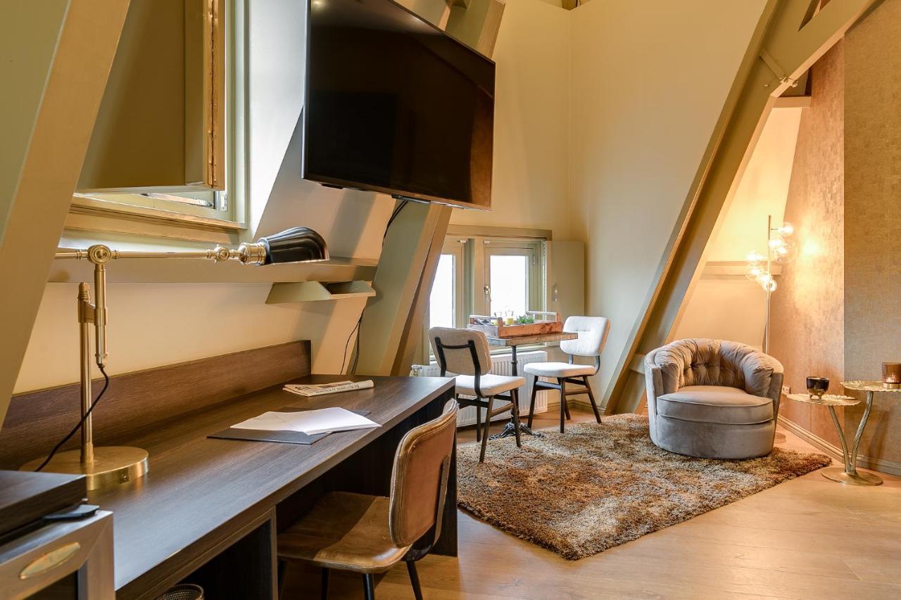 Brasss Hotel Suites Haarlem Esterno foto The interior of a typical apartment